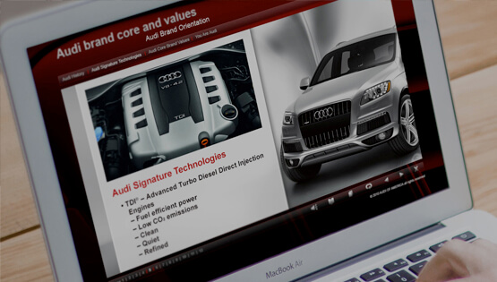Screenshot of AUDI History Interactive eLearning app as shown on laptop