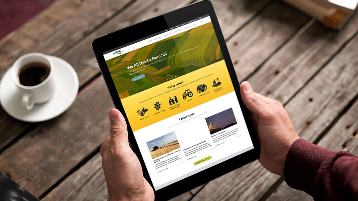 NASDA website shown on tablet