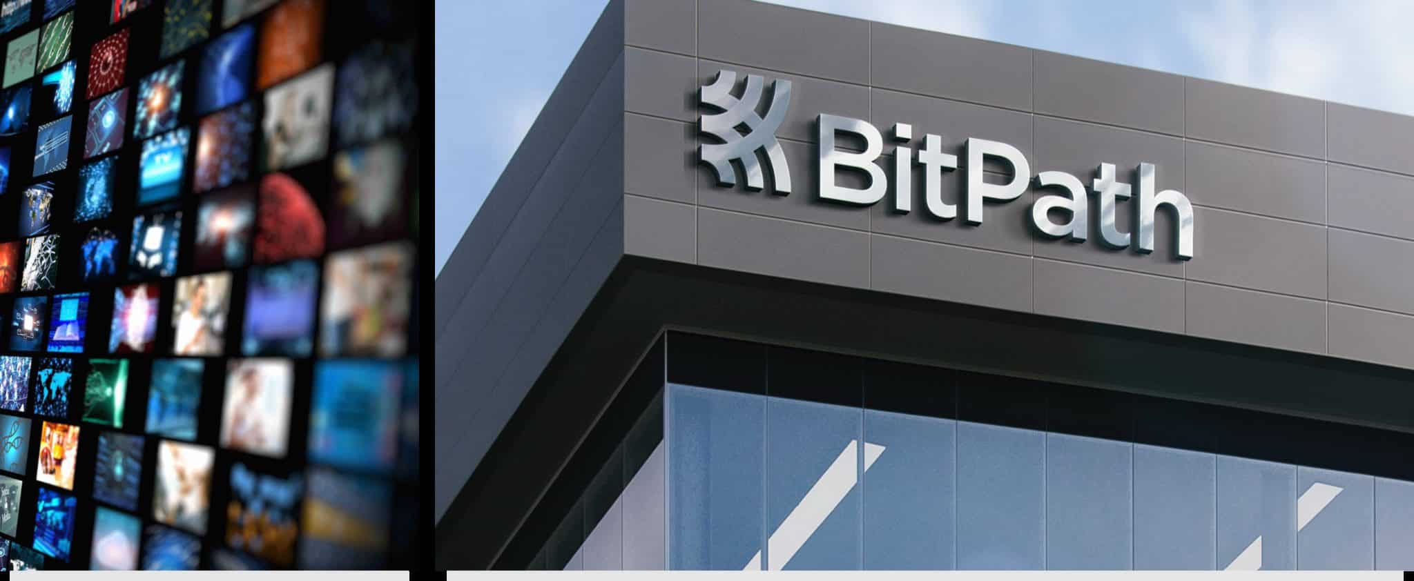 BitPath exterior building signage alongside a wall of broadcast television screens