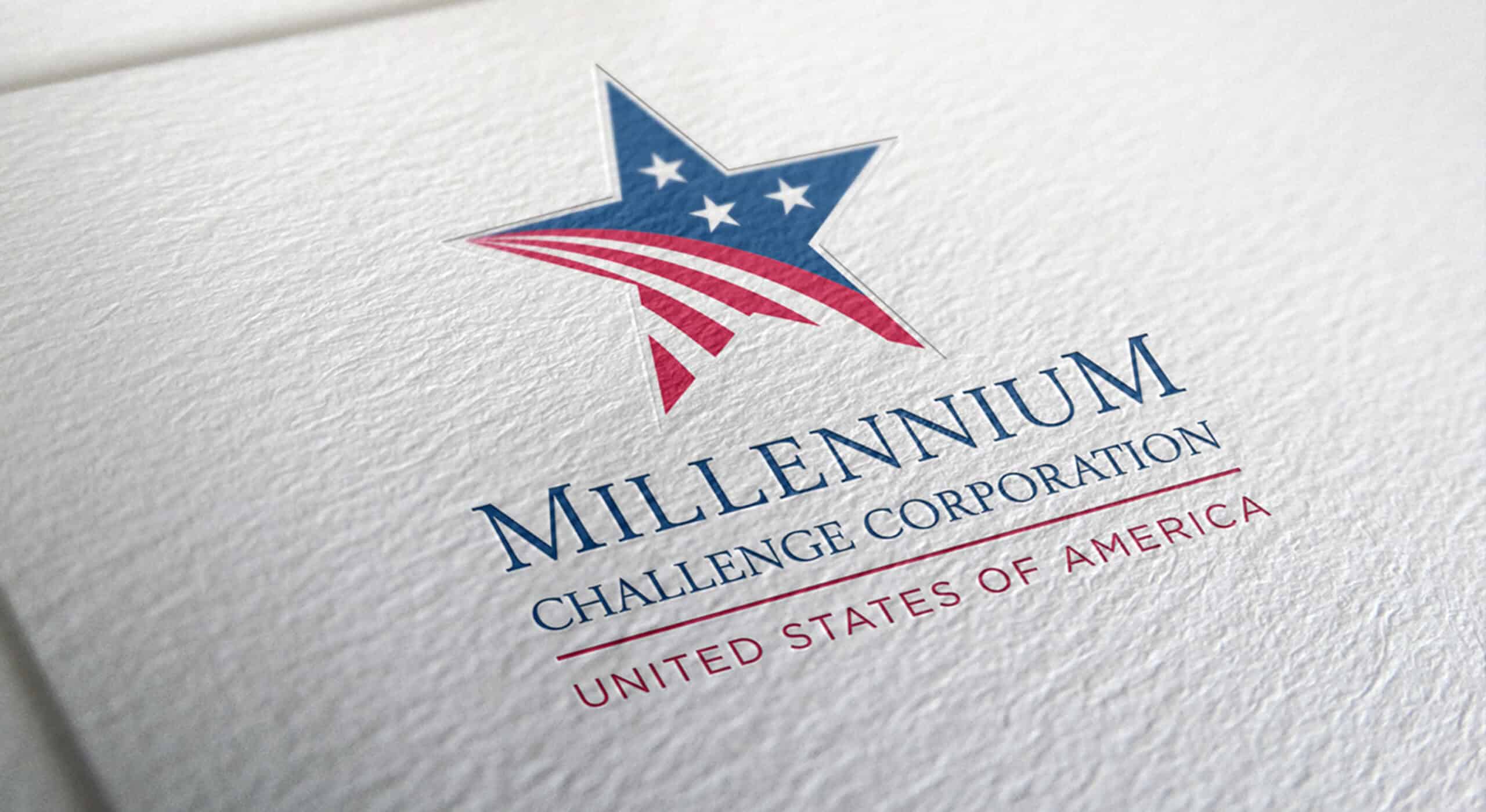 Millennium Challenge Corporation embossed brand mark on official materials and collateral