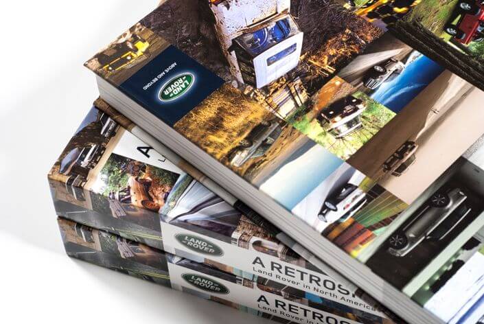 Land Rover reference guide interior spread: Range Rover chapter with photography and specifications